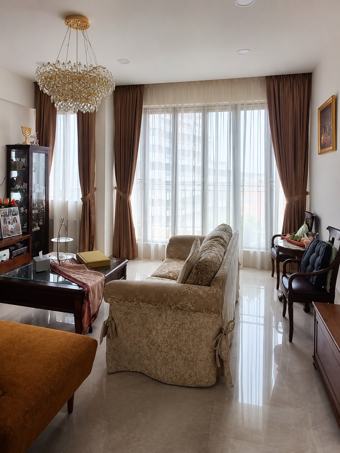 Singapore condominium living room with full-height custom curtains and sheers
