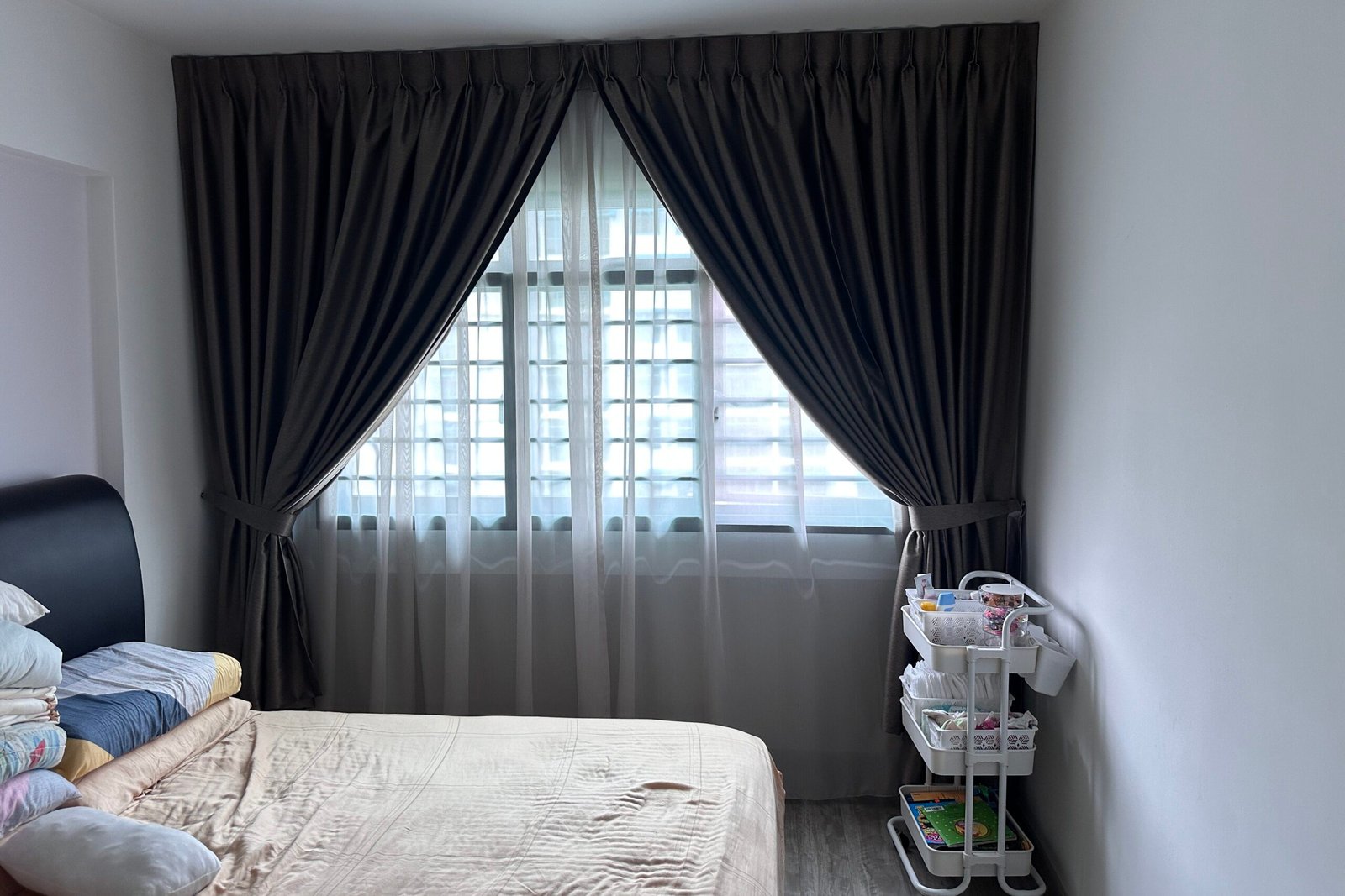 Custom day and night curtains installed in modern Singapore HDB bedroom by Yoru Interior