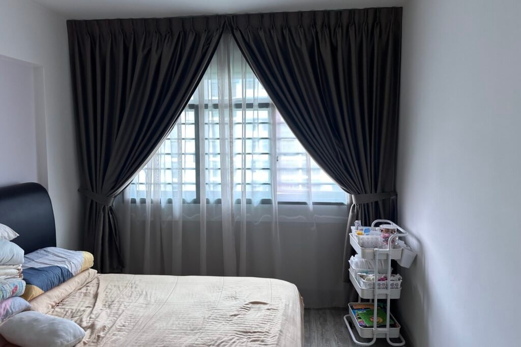 Custom day and night curtains installed in modern Singapore HDB bedroom by Yoru Interior