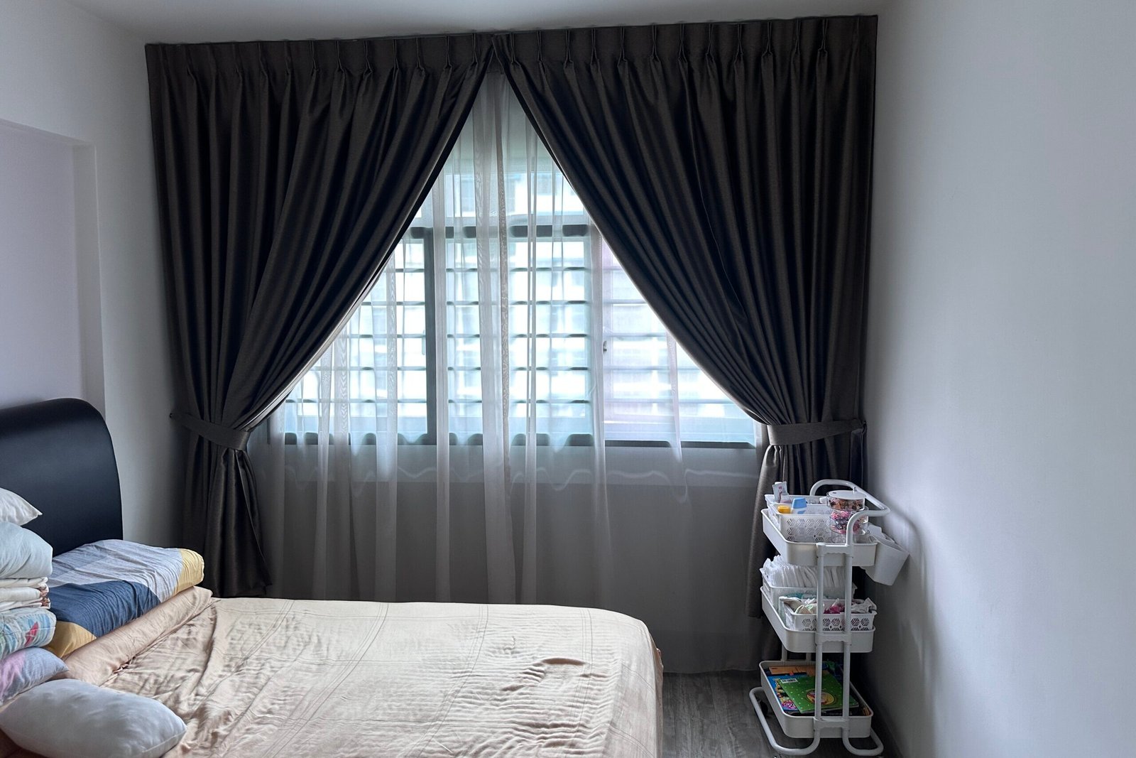 Custom day and night curtains installed in modern Singapore HDB bedroom by Yoru Interior