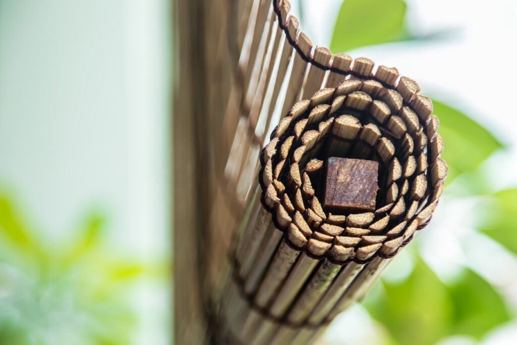 green plant with traditional style bamboo curtain background Bamboo Blinds installed at outdoor Singapore