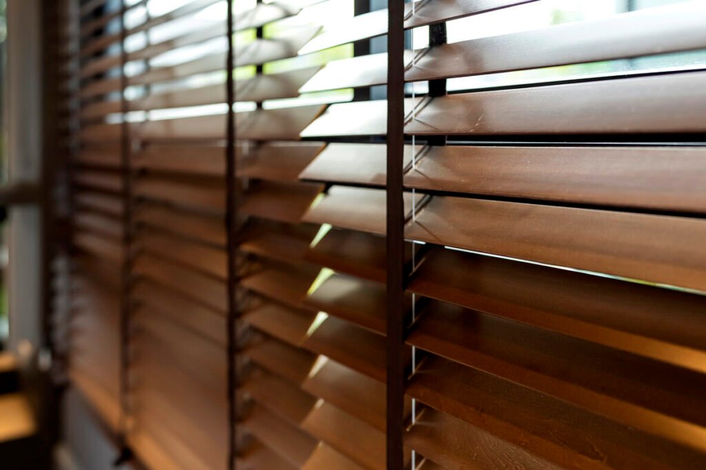 wooden window shutter blind with light from sun home interior concept PVC Venetian Blinds installed in HDB Singapore