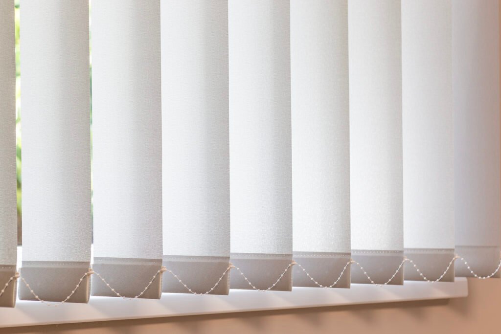 Vertical Fabric Blinds for Light Control and Privacy Vertical Blinds installed in an office in Singapore